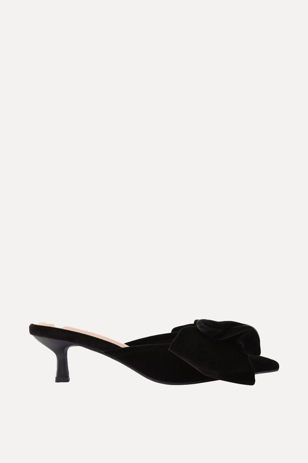 Sophia Bow-Embellished Heeled Velvet Mules from Kurt Geiger